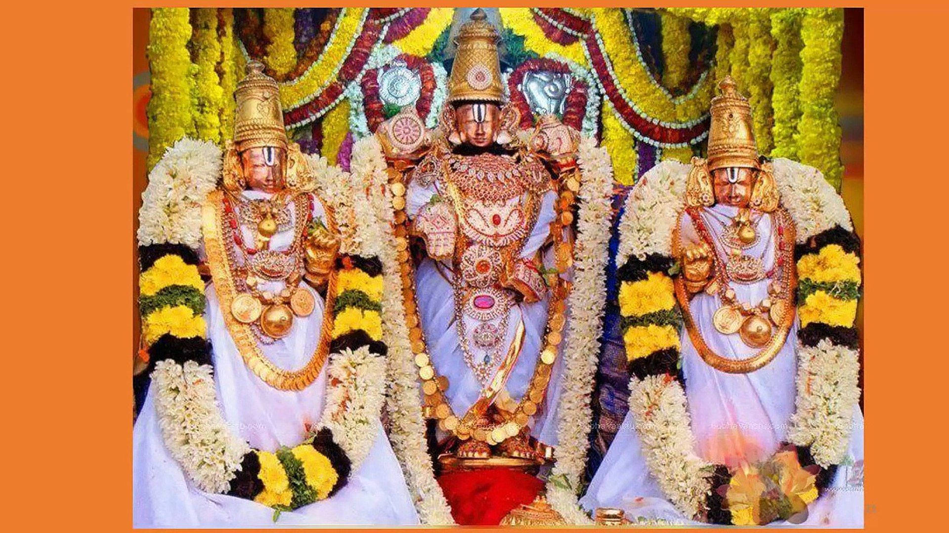 Three Lord Venkateswara Statues With Garlands Background