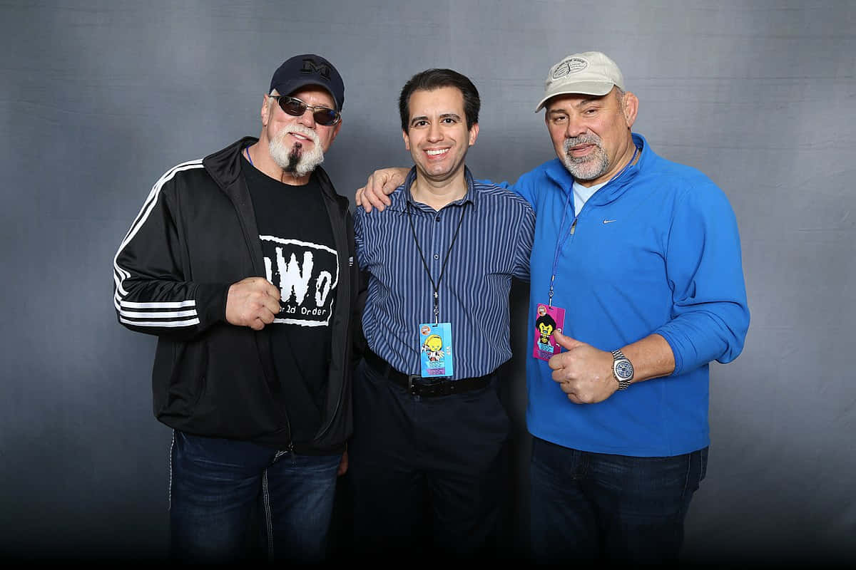 Three Men Posingat Event Background