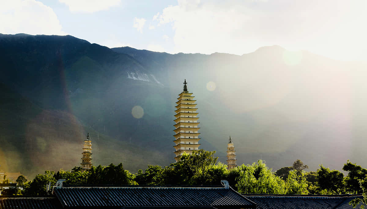 Three Pagodas With Lens Flare