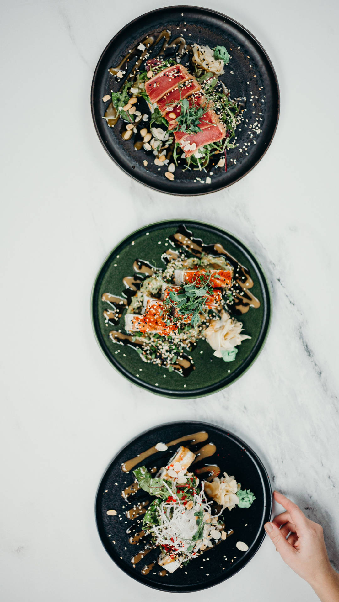 Three Plates With Food On Them Background