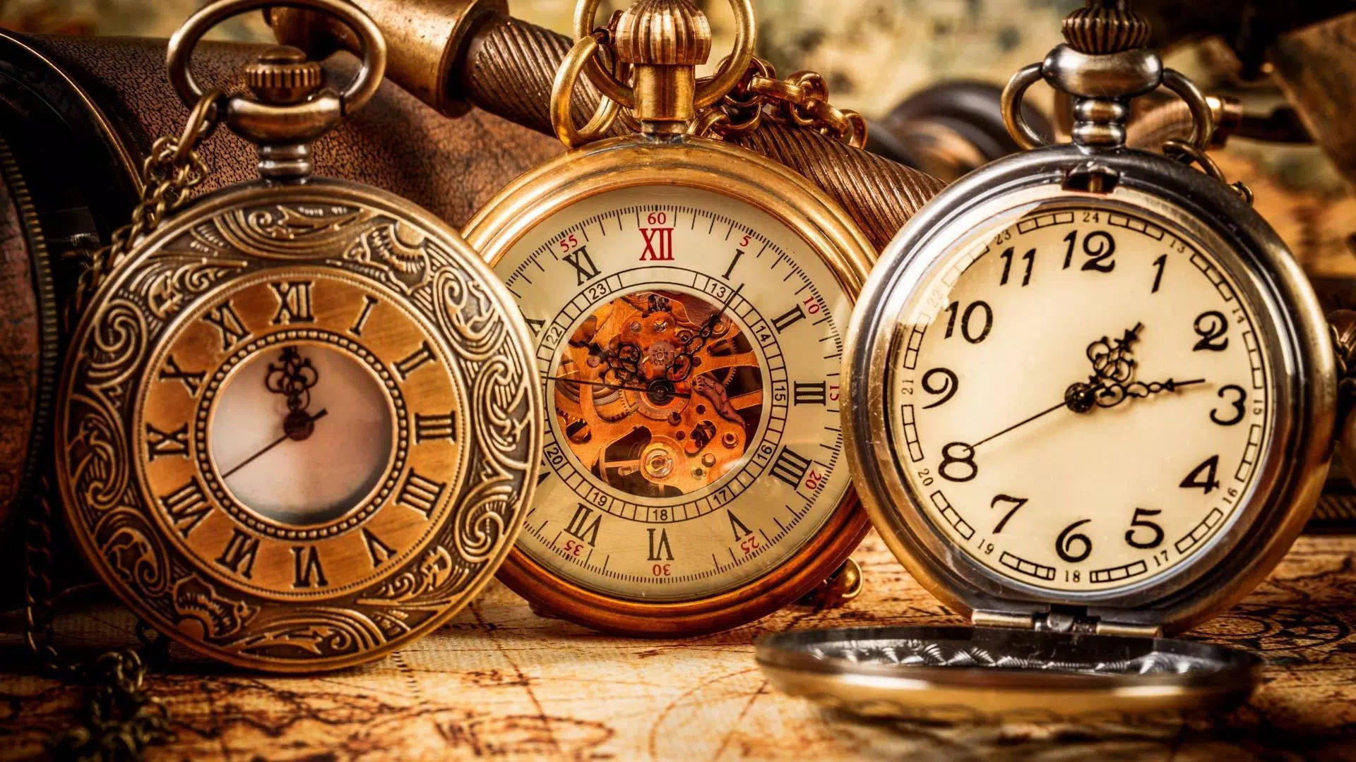 Three Pocket Watches Showing Time Background