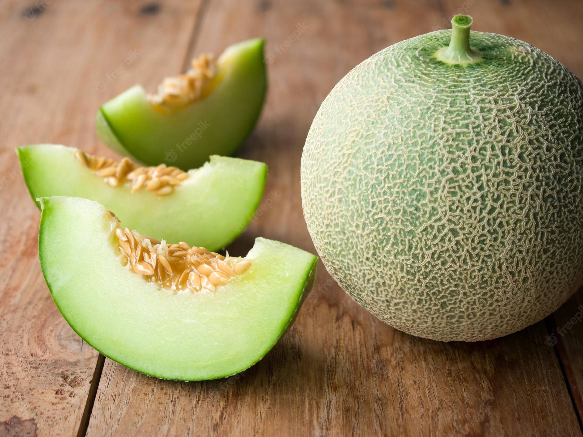 Three Slices Honeydew Melon Background