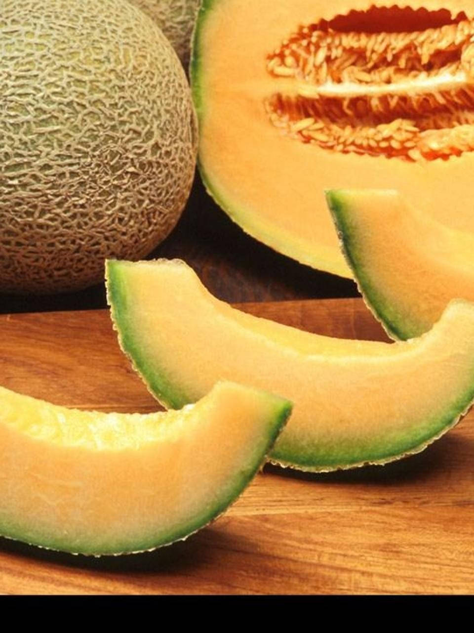 Three Slices Of Honeydew Melon Background