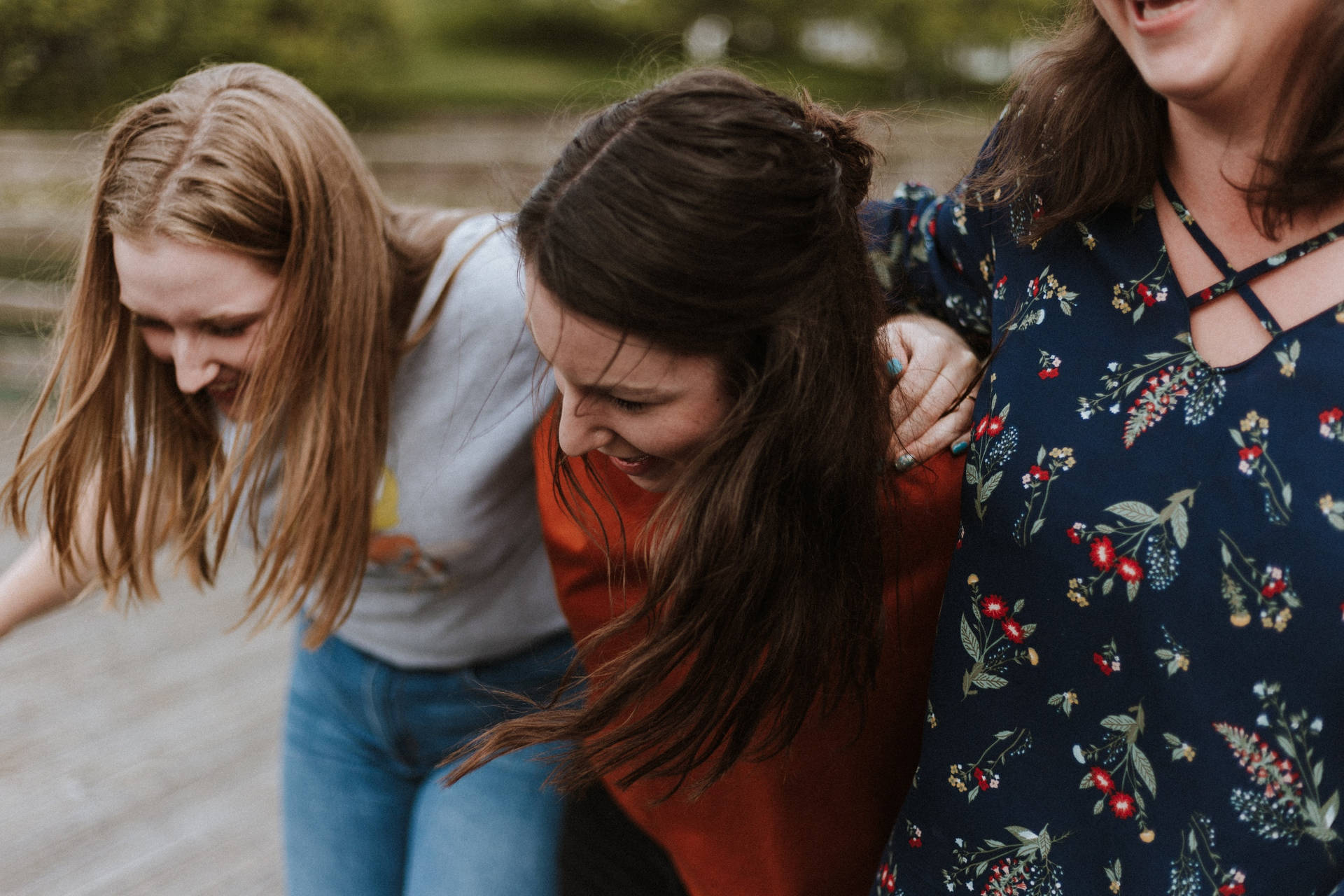 Three Teenage Girls Laughing Background