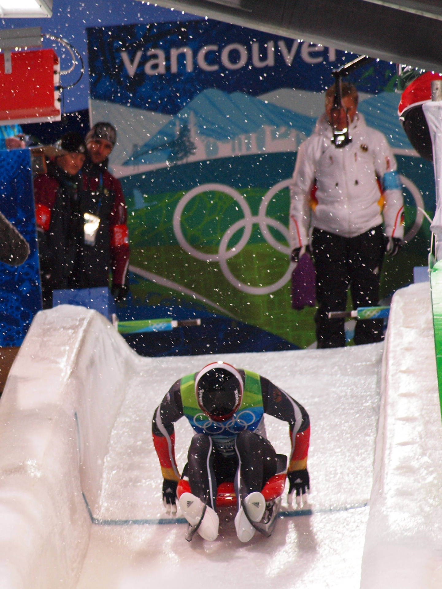 Thrilling Action At The Vancouver 2010 Luge Event Background