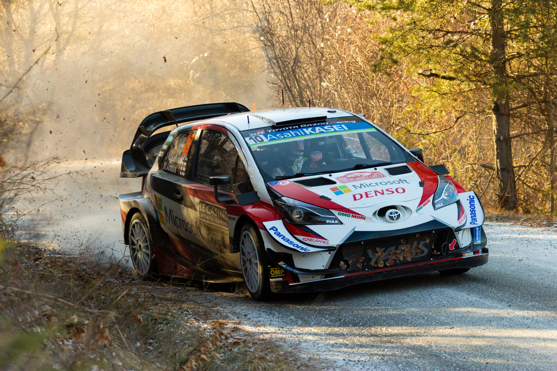 Thrilling Action On Track - Dirt Rally Toyota Yaris Background