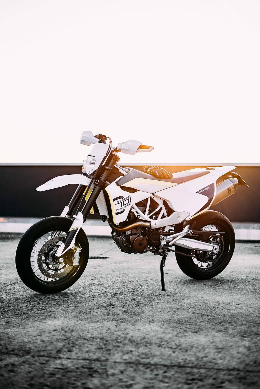 Thrilling Adventure With White Dirt Bike Background