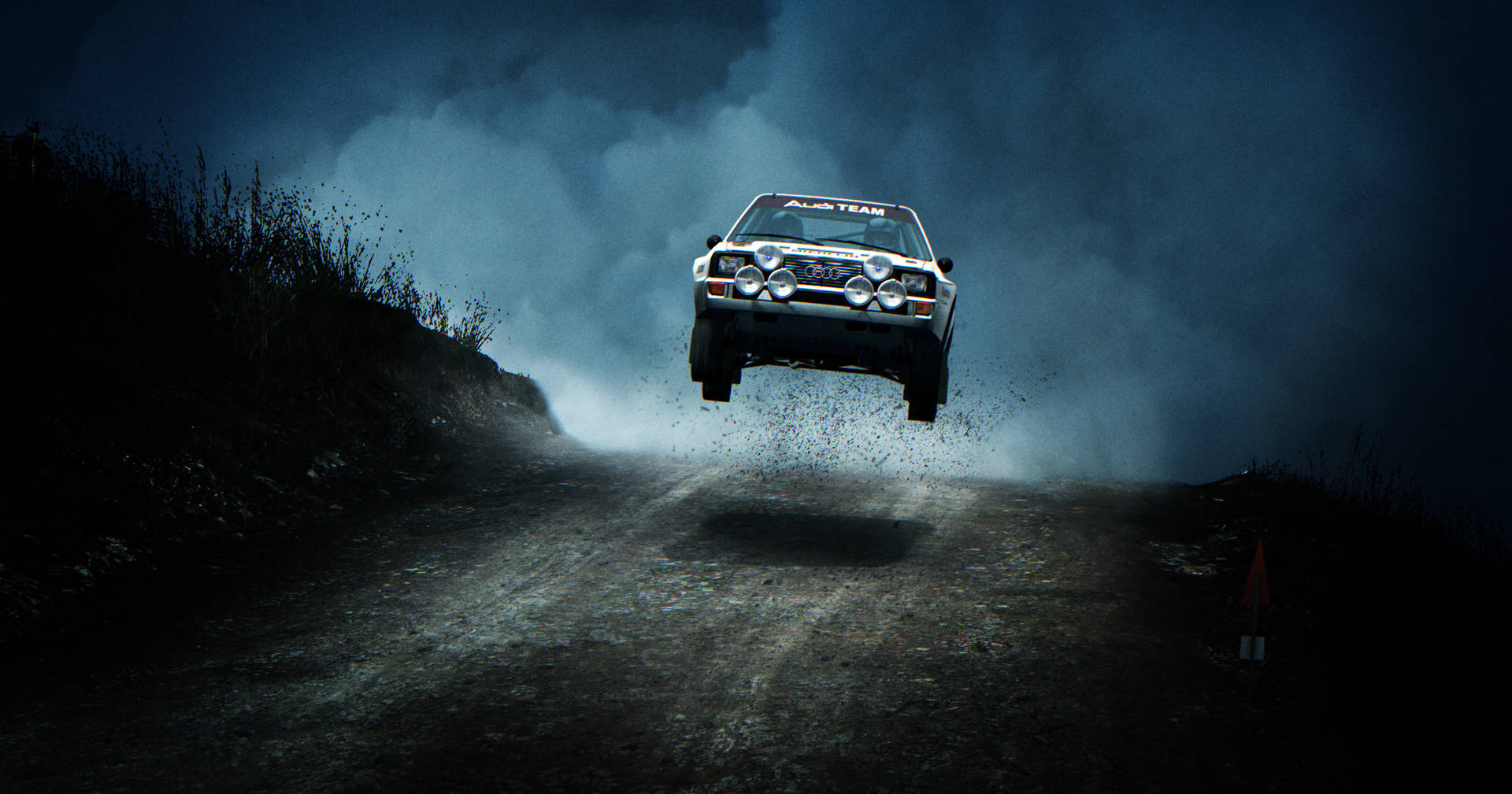 Thrilling Jump Action In Dirt Rally Background