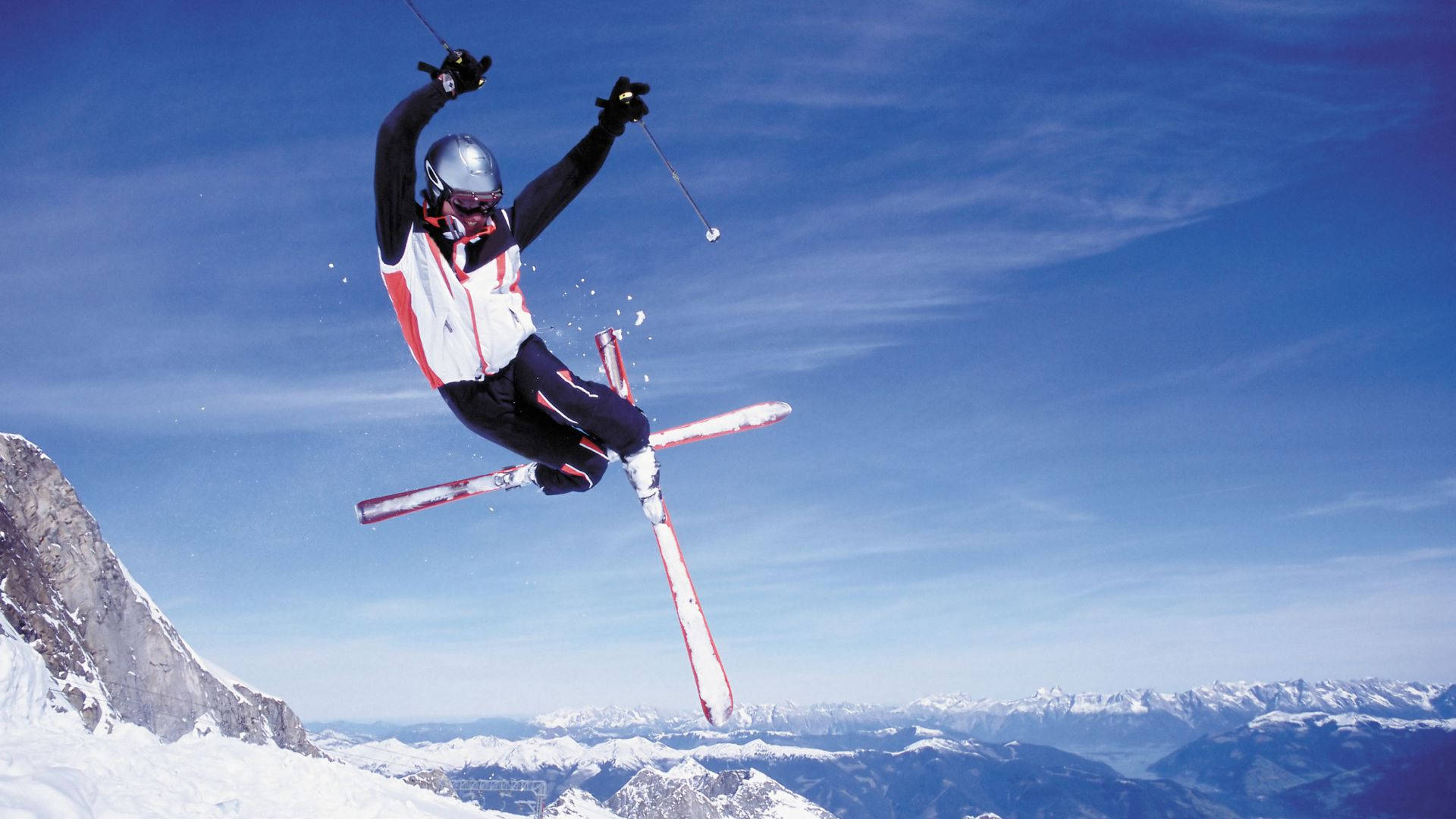 Thrilling Ski-jump Mid-air Action Background