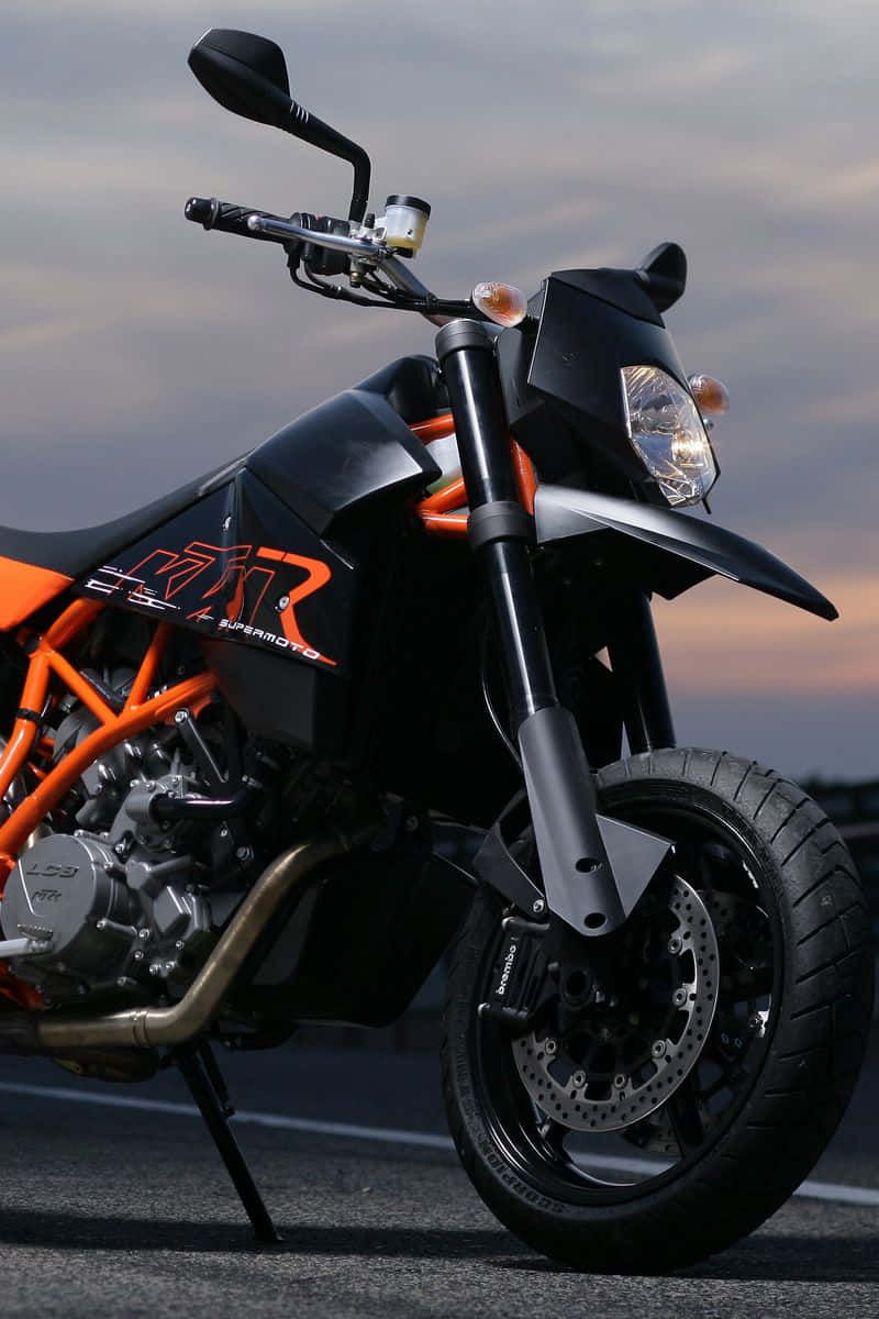Thrilling Speed Adventure - Ktm Sports Motorcycle Background