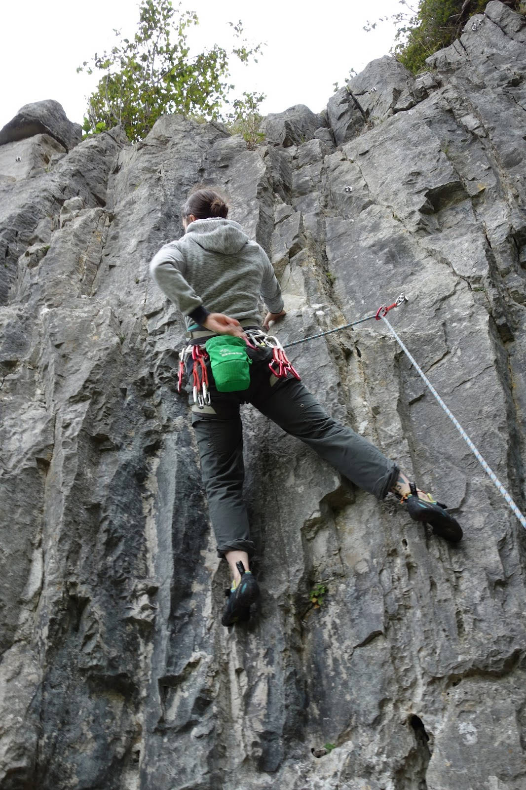 Thrilling Sport Climbing Mountainside Background