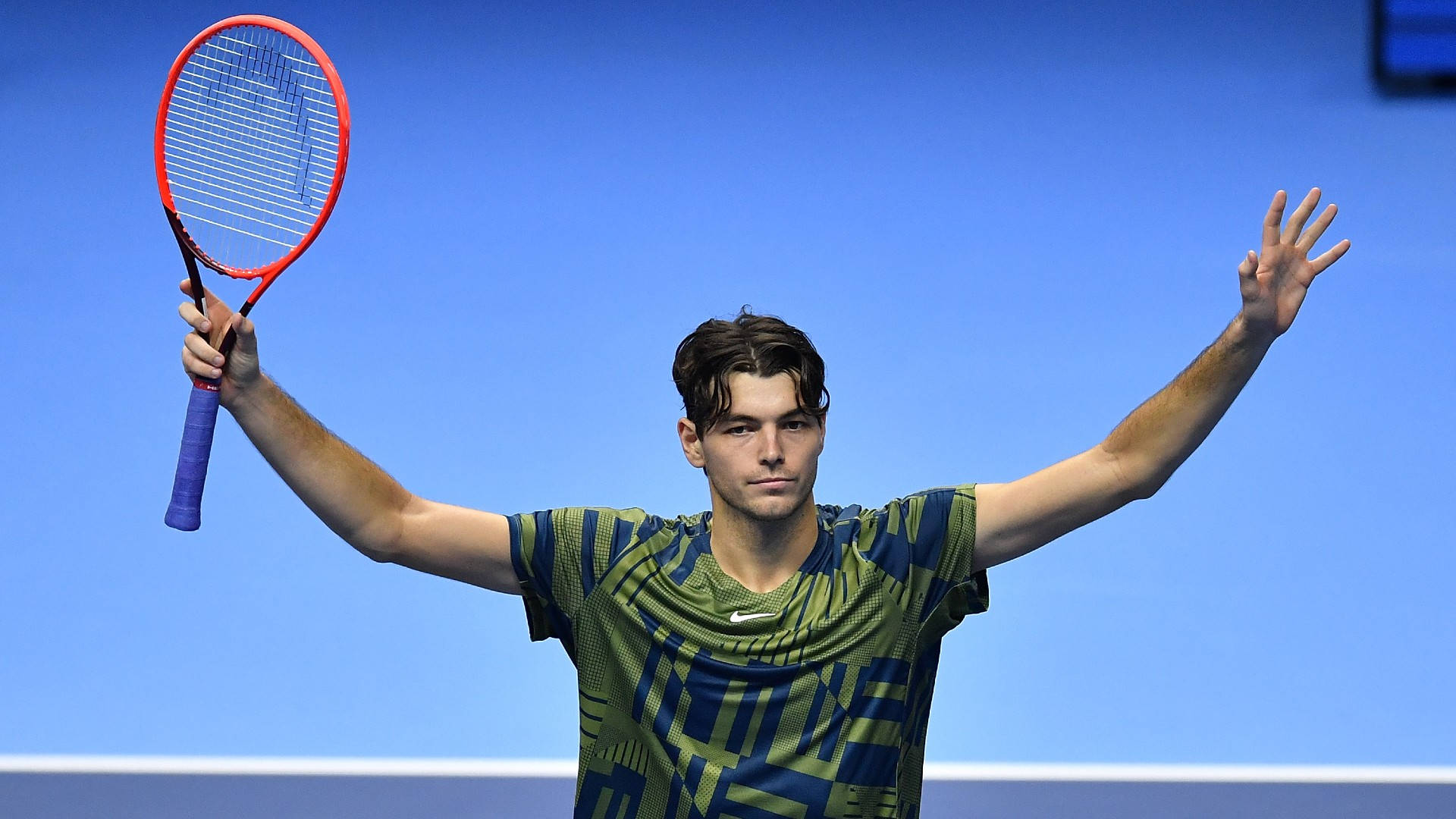 Thrilling Victory - Taylor Fritz Celebrating Success