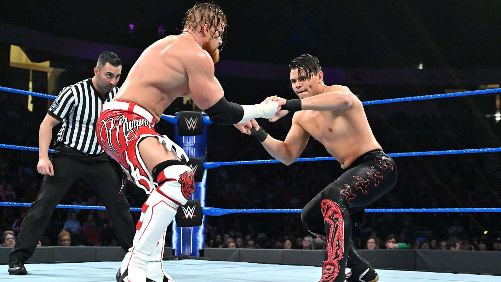 Thrilling Wrestling Showdown - Buddy Murphy Vs. Humberto Carrillo In Open Challenge Background
