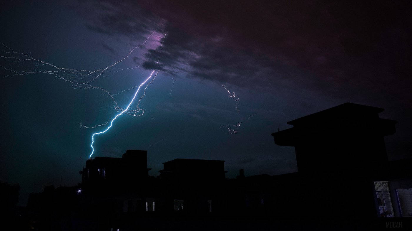 Thunderstorm Over Houses