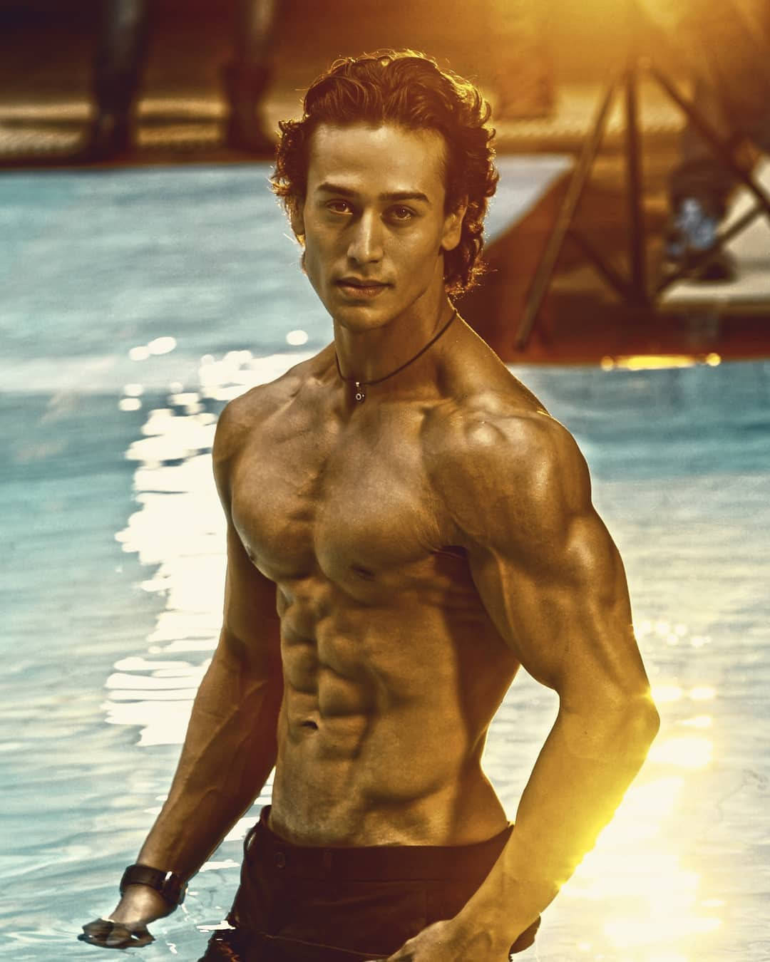 Tiger Shroff Body Glistening Outdoors Background