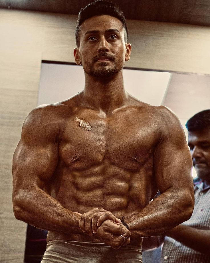 Tiger Shroff Body Sculpted And Toned Background