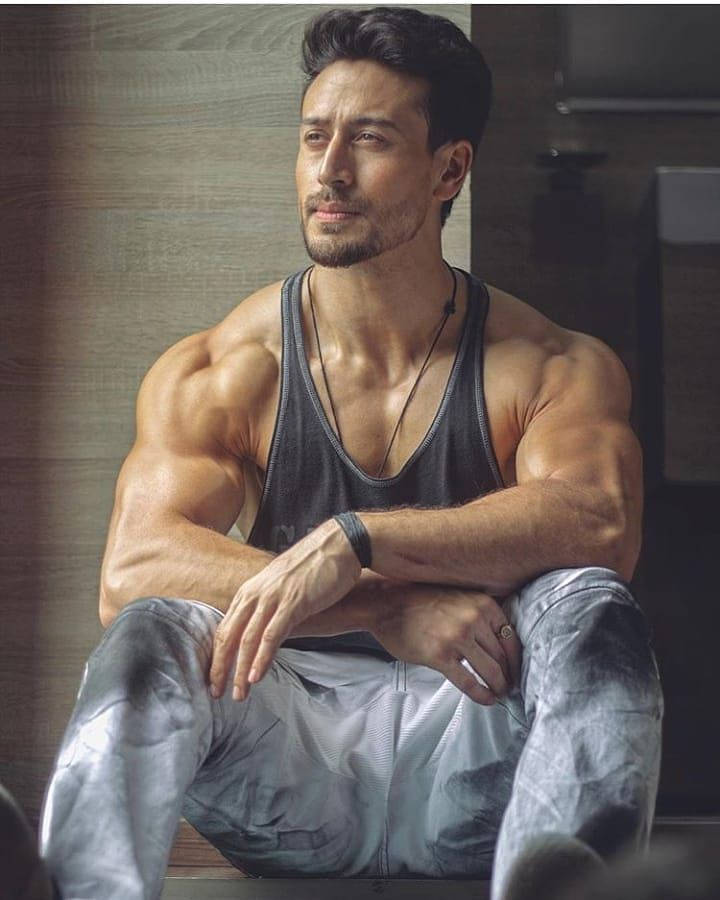 Tiger Shroff Body While Sitting Background