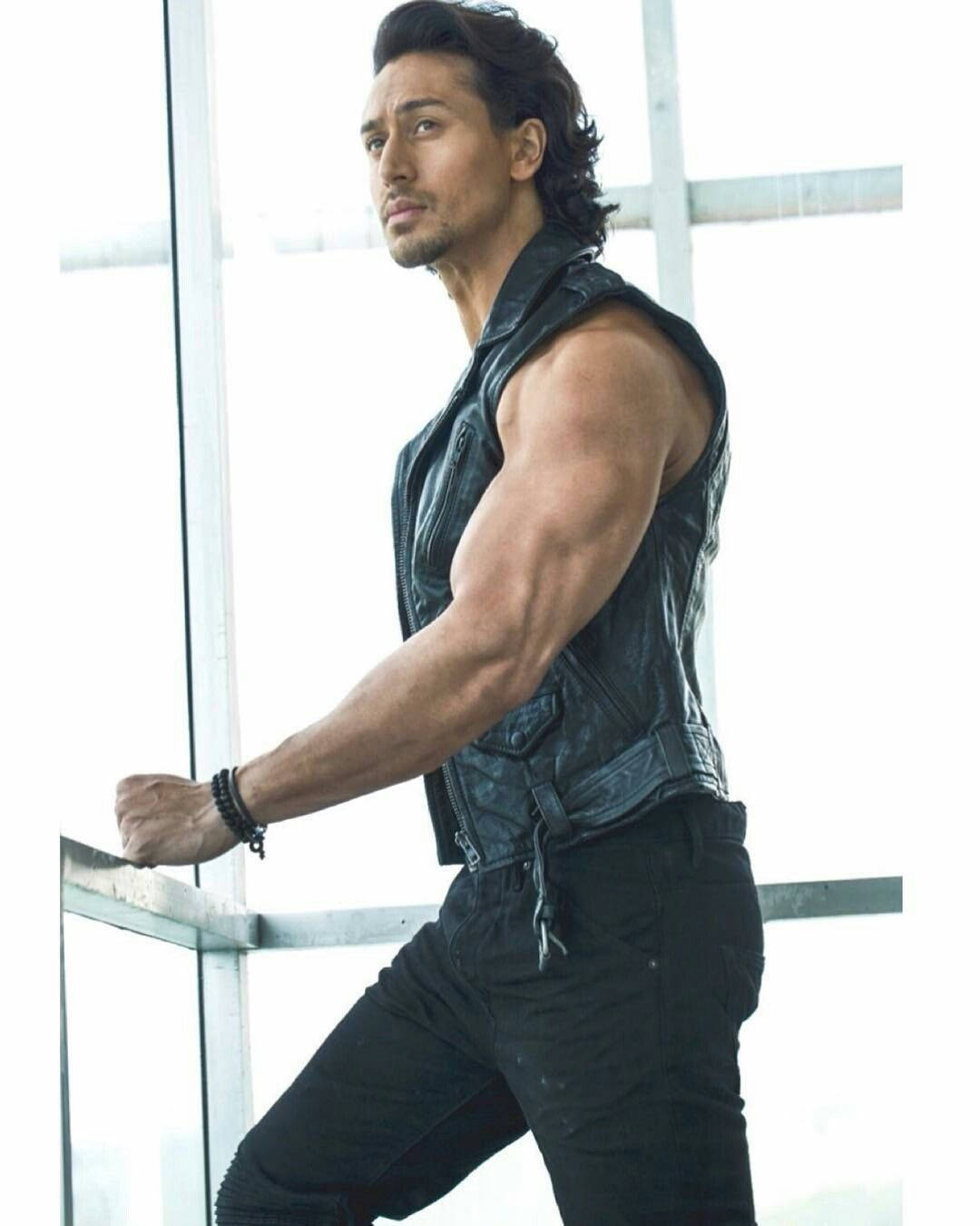 Tiger Shroff Body With Leather Vest Background