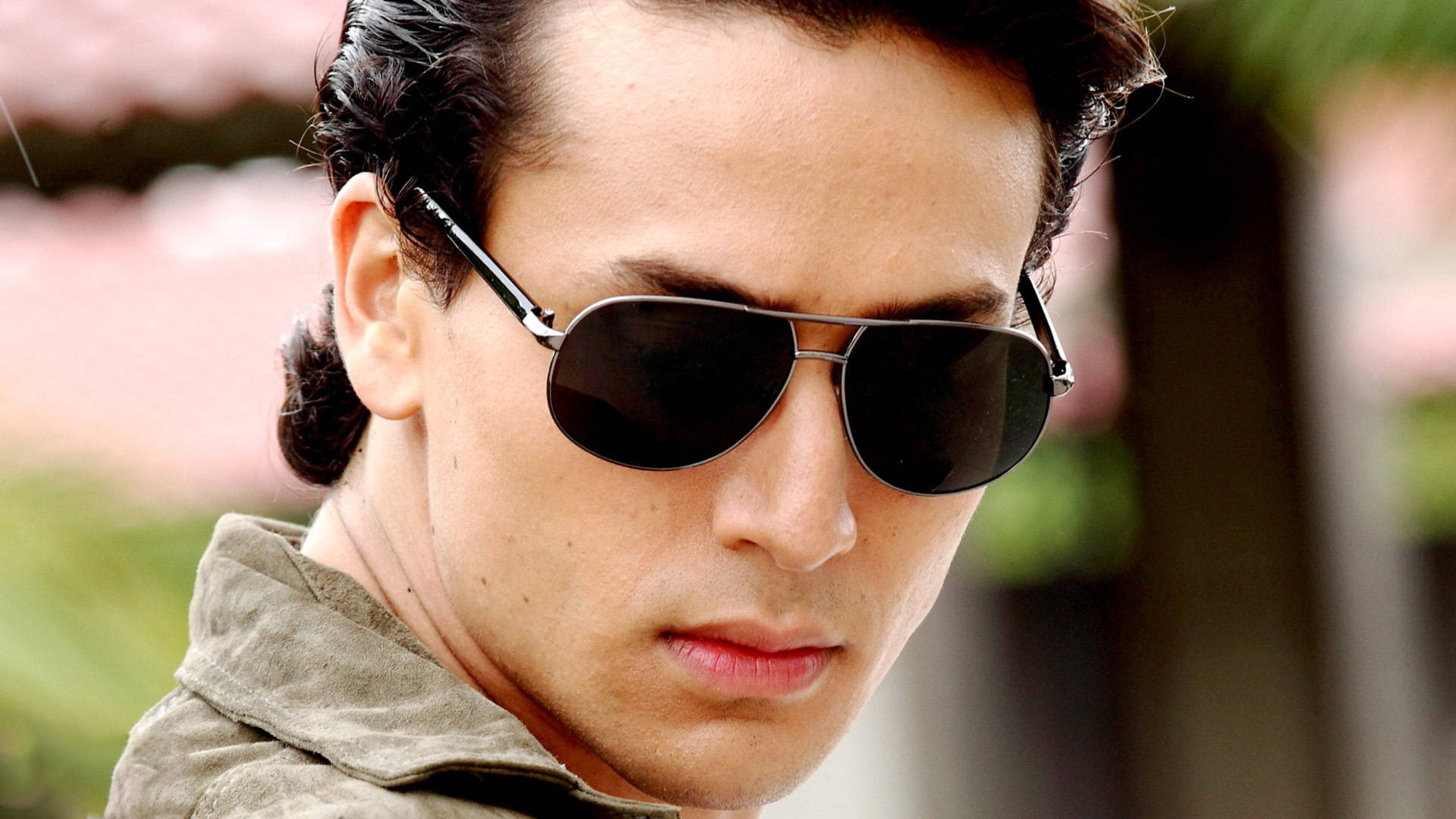 Tiger Shroff With Aviator Glasses Background