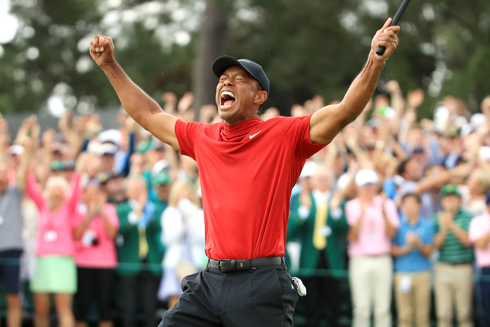 Tiger Woods Masters Celebrating Nike Swoosh Background