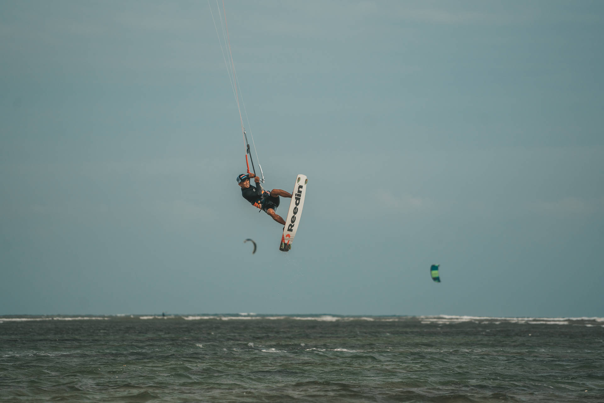 Tilted Windsurfing In Air Background