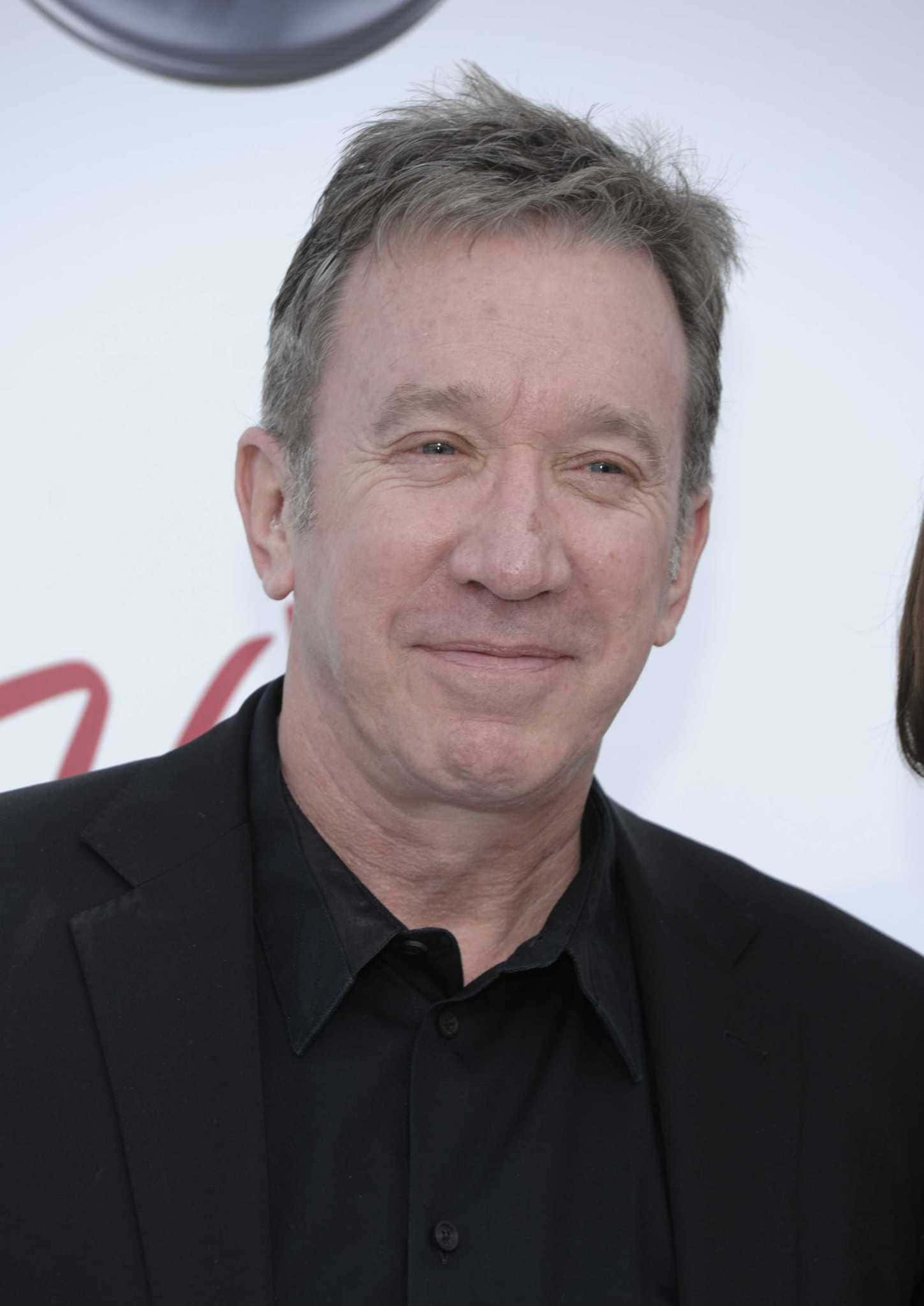 Tim Allen, Beloved Comedic Actor Standing On A Stage. Background