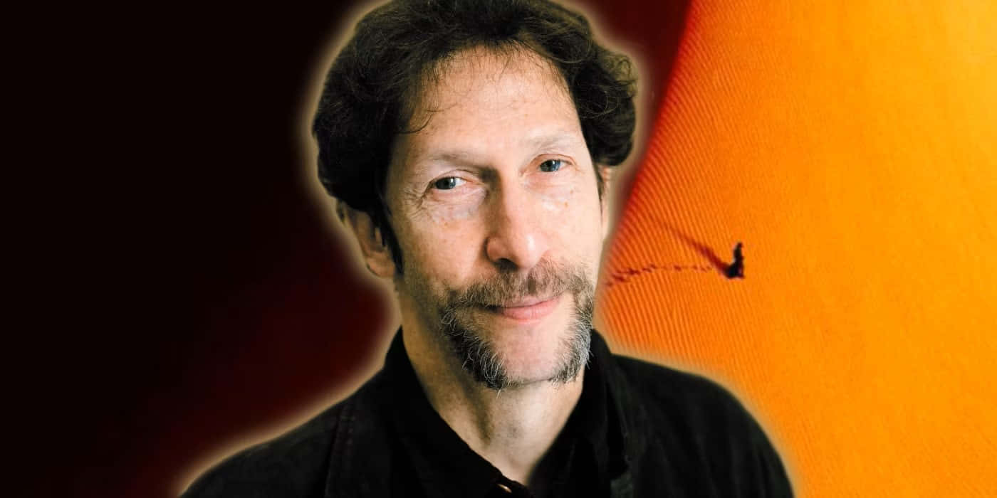 Tim Blake Nelson Posing In A Dapper Outfit At An Event