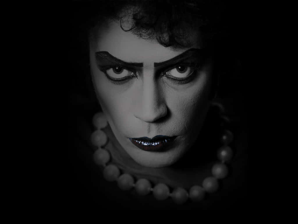 Tim Curry Smiling At An Event Background