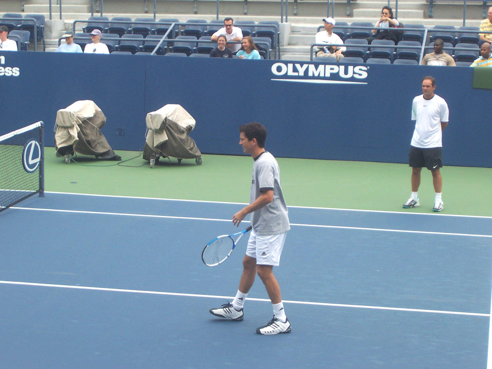 Tim Henman In Tennis Court Background