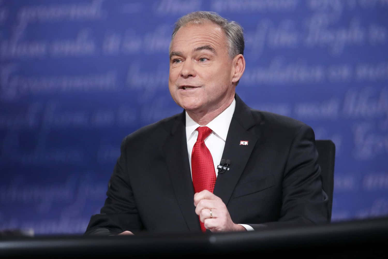 Tim Kaine In Black Suit Background