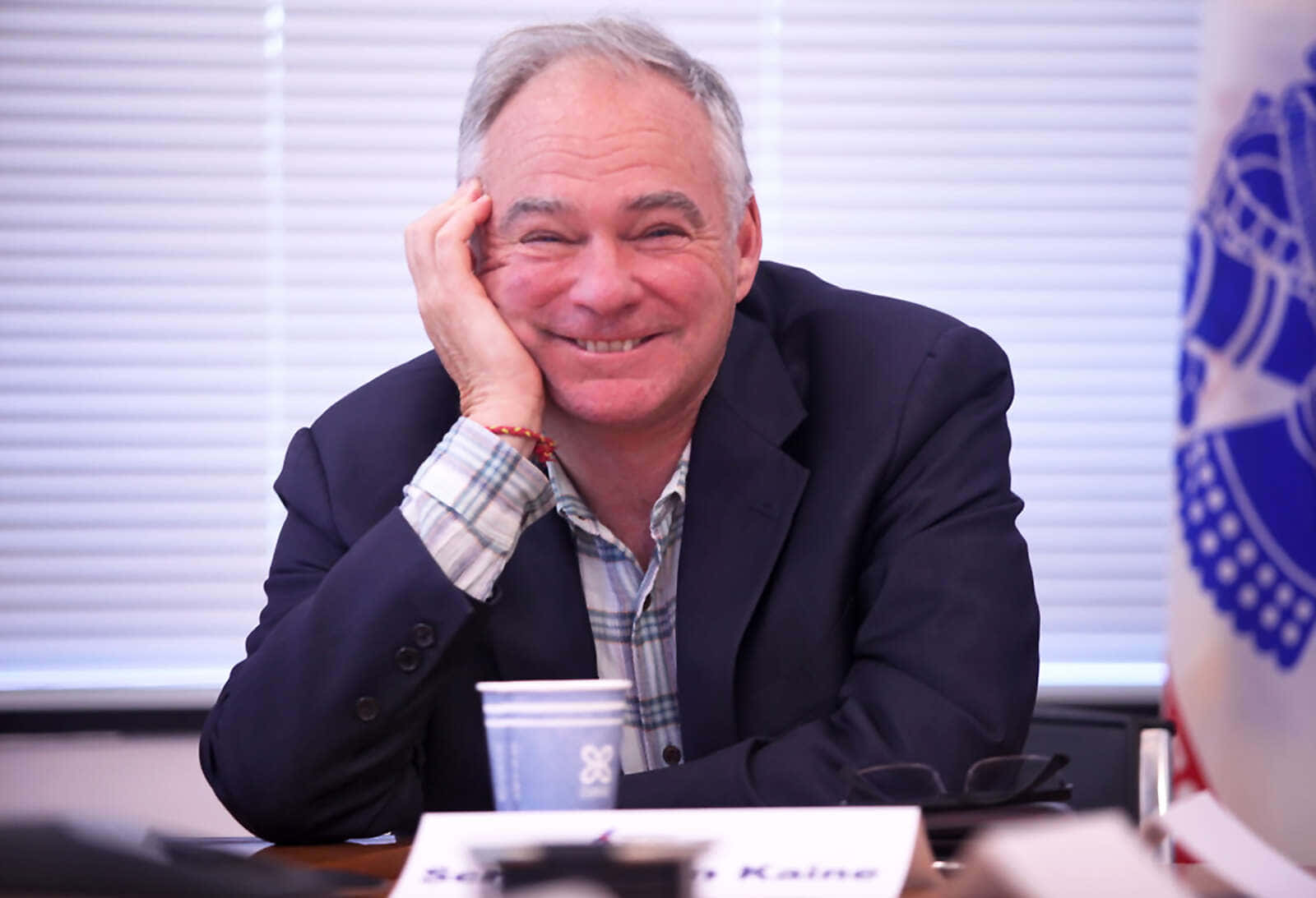 Tim Kaine With A Big Smile Background