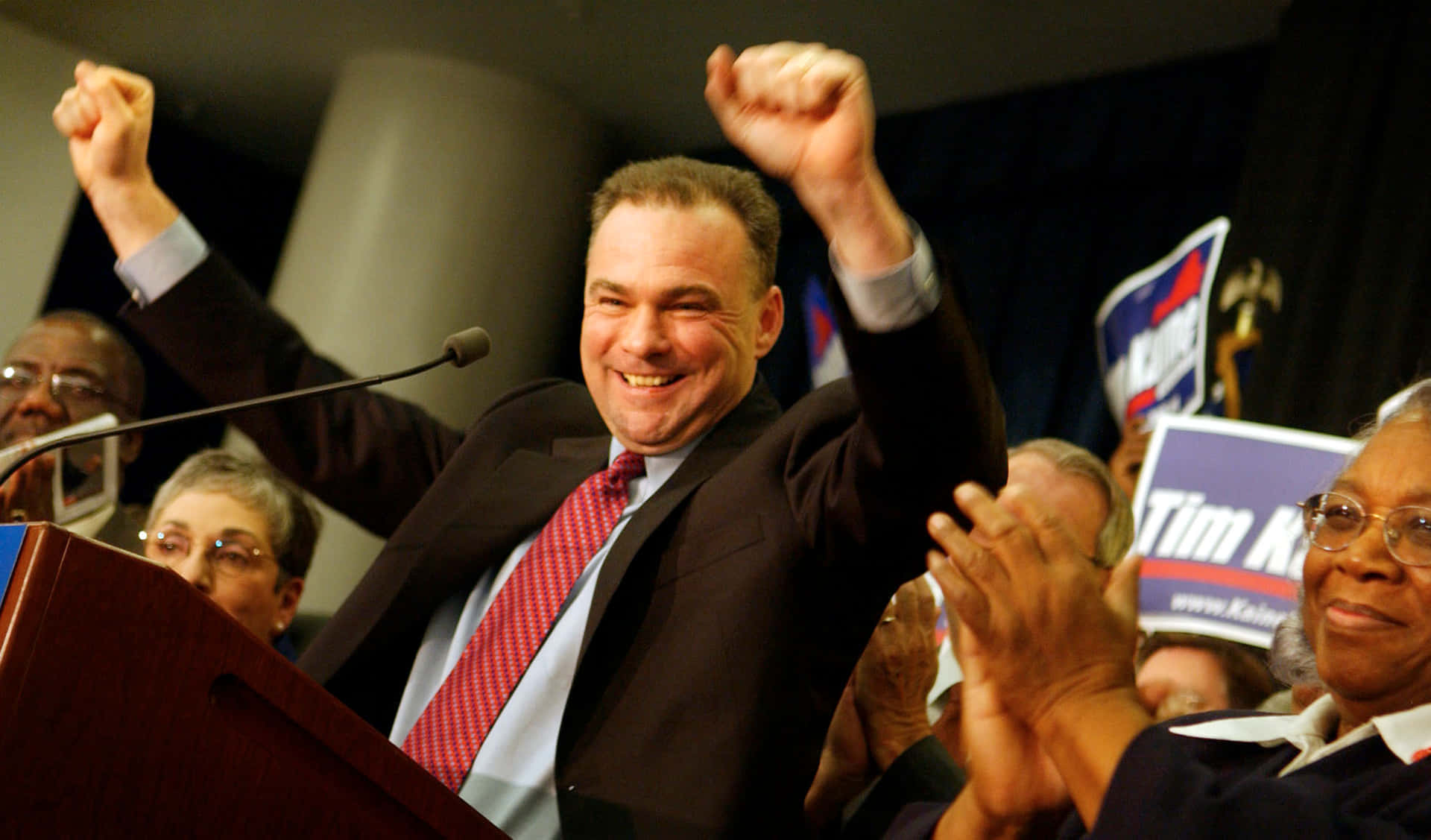 Tim Kaine With Clenched Fists Background
