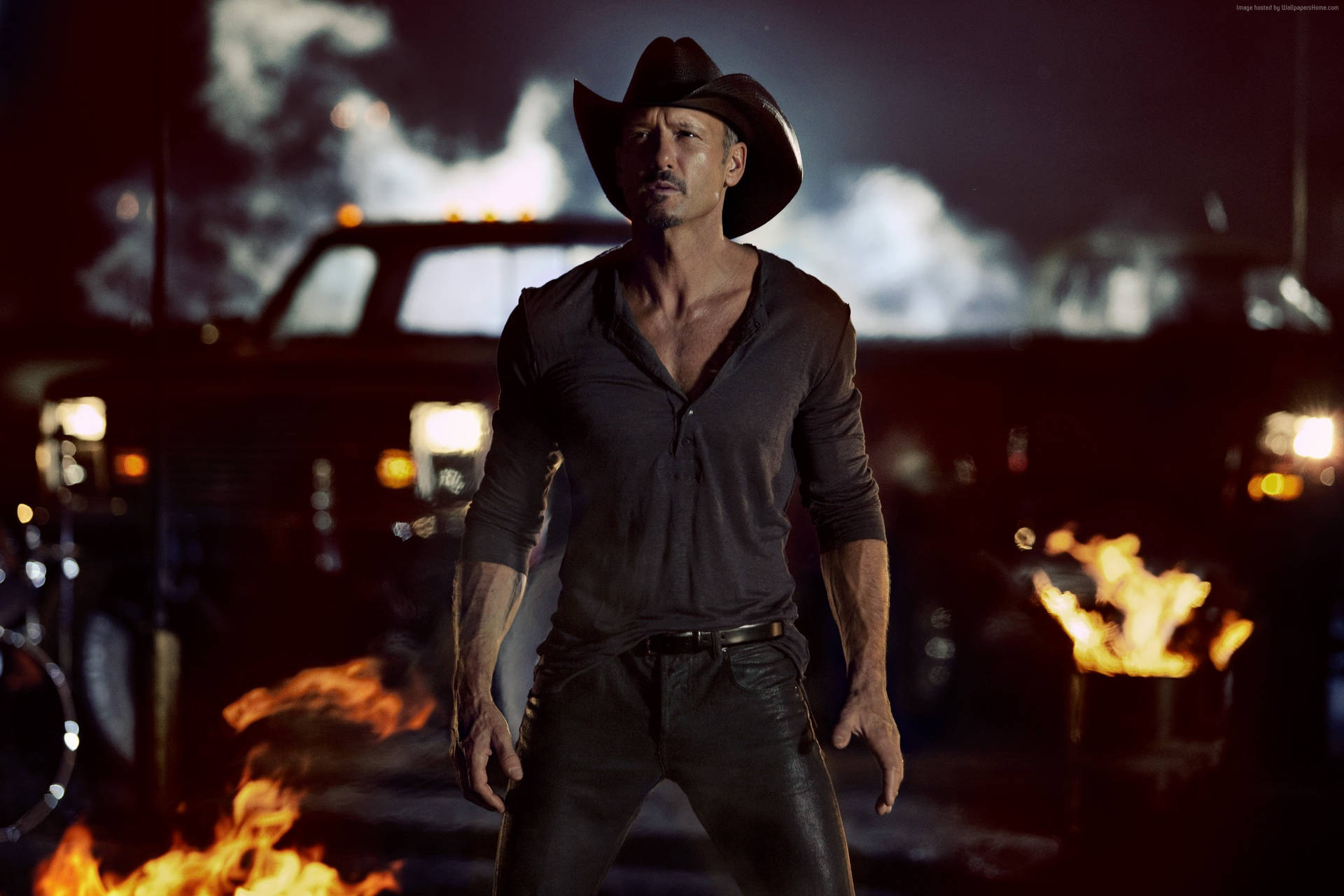 Tim Mcgraw Cars And Burning Cans Background