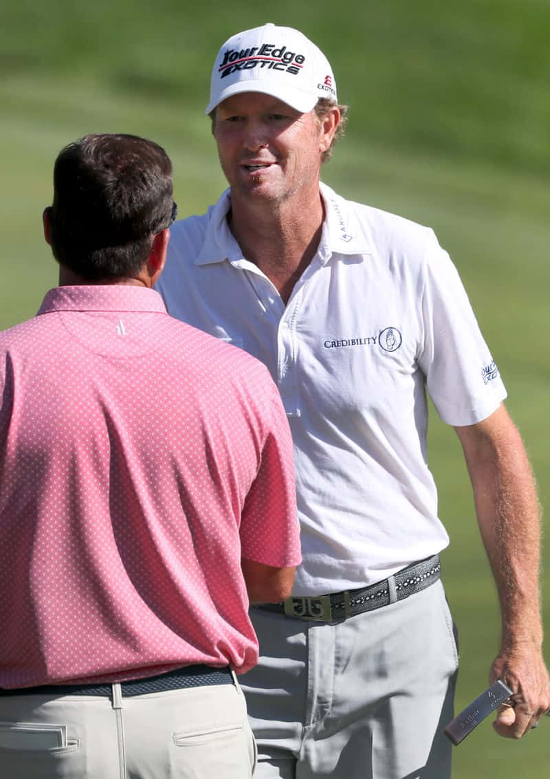 Tim Petrovic Talking To A Man Background