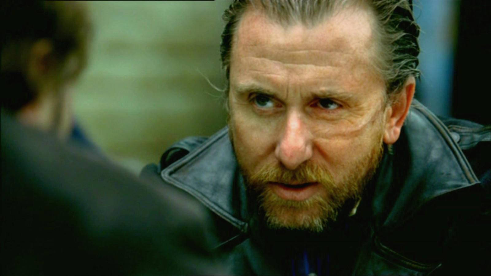 Tim Roth Portraying The Character Death Larsen In Sea Wolf Background