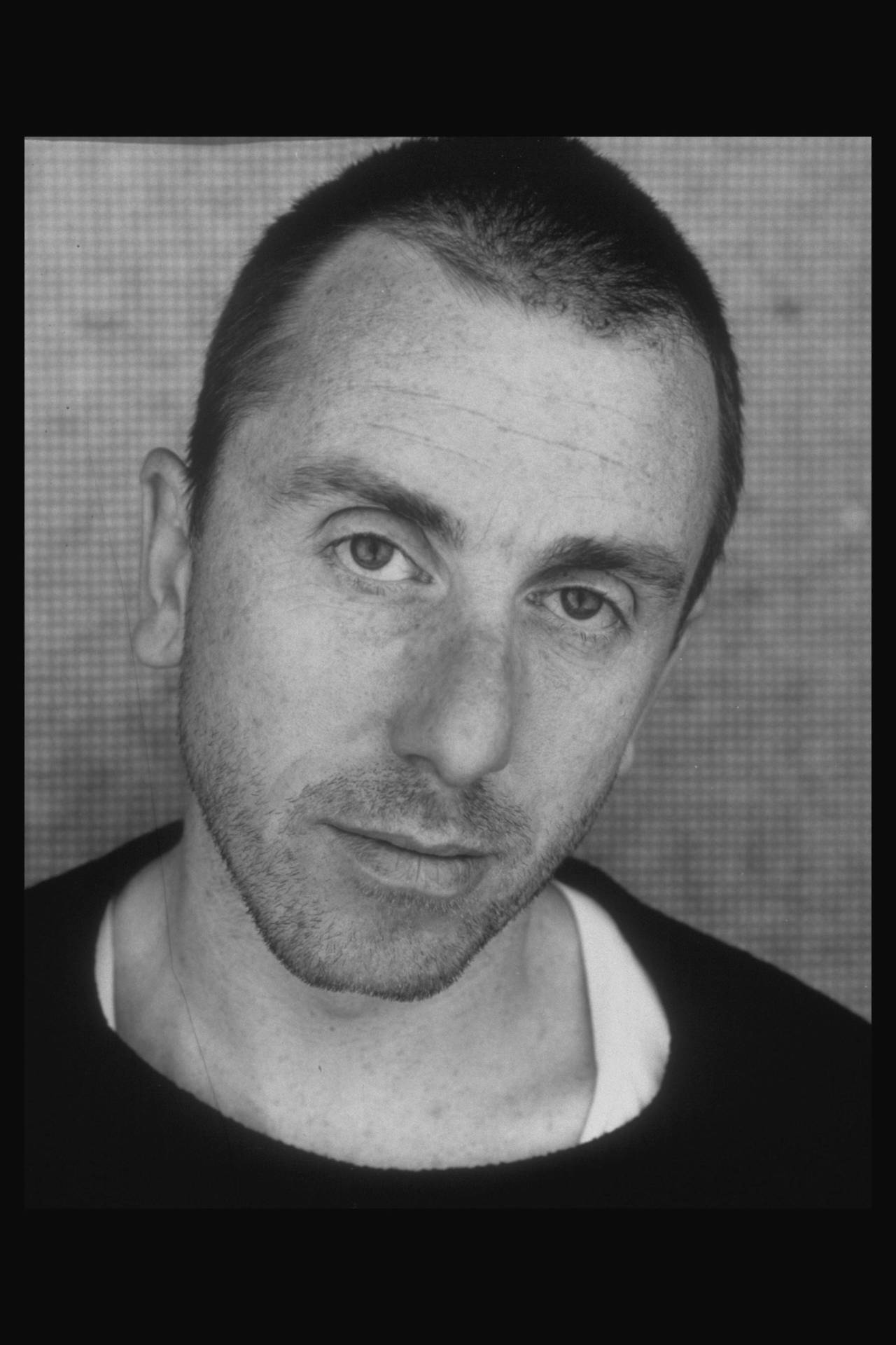 Tim Roth Sporting A Buzz Cut During His Early Acting Career Background