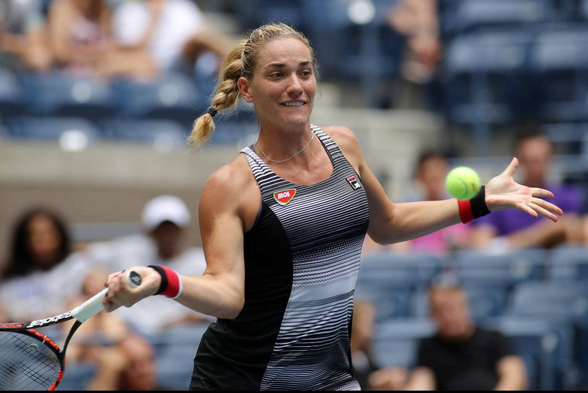 Timea Babos Eyeing Ball Background