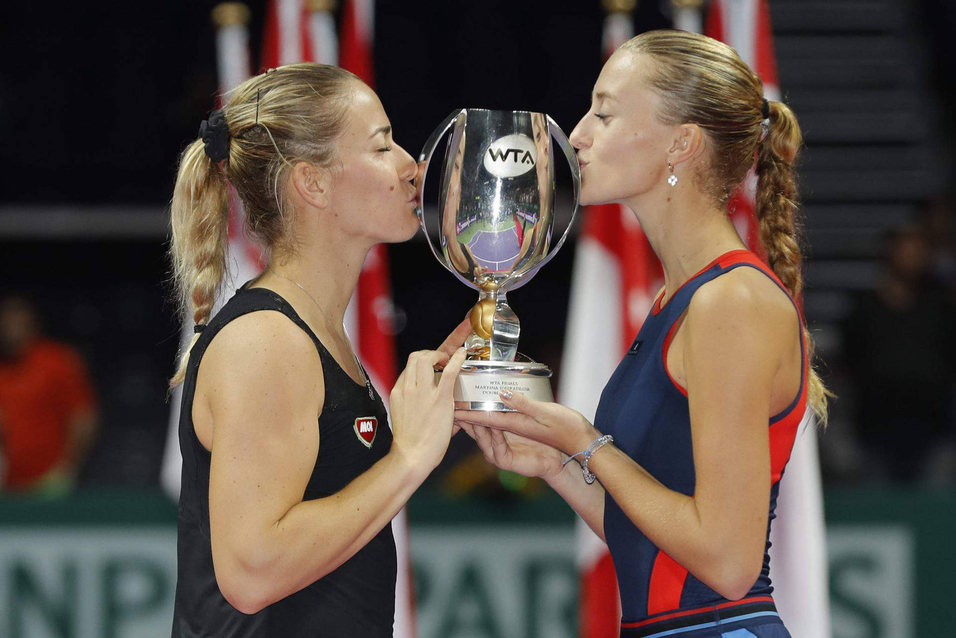 Timea Babos Kissing Wta Cup Background