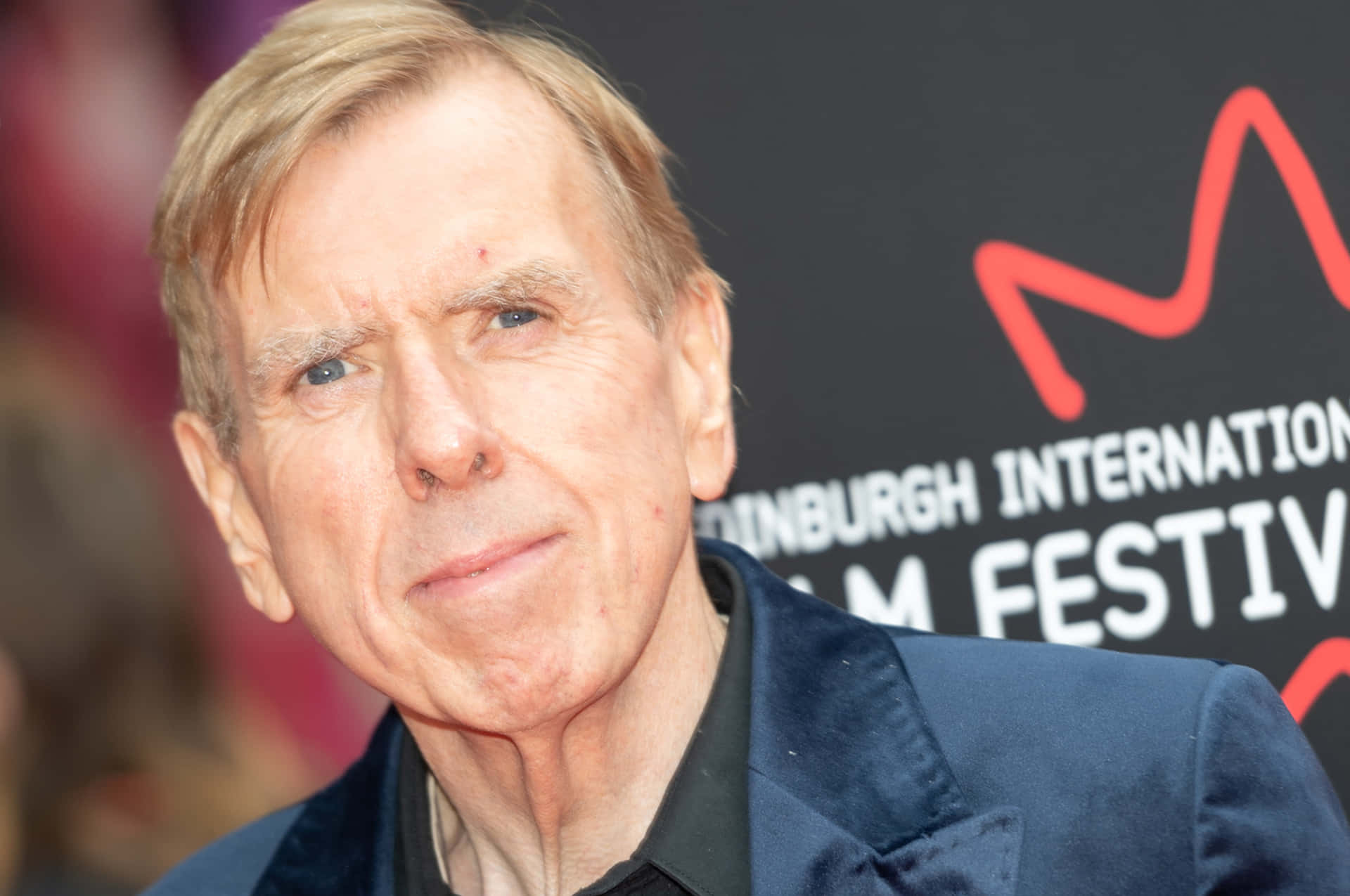Timothy Spall In A Charming Pose Background