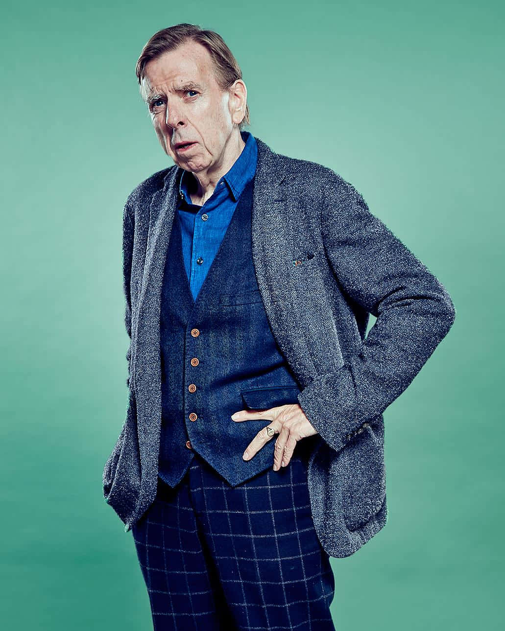 Timothy Spall Posing For A Portrait Background