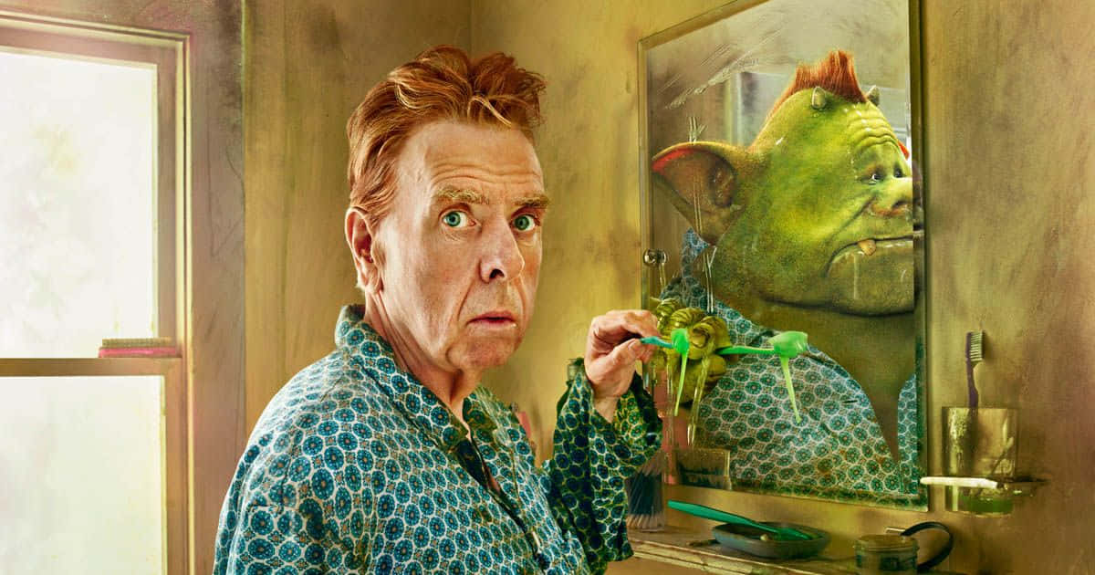 Timothy Spall Posing For A Portrait Background