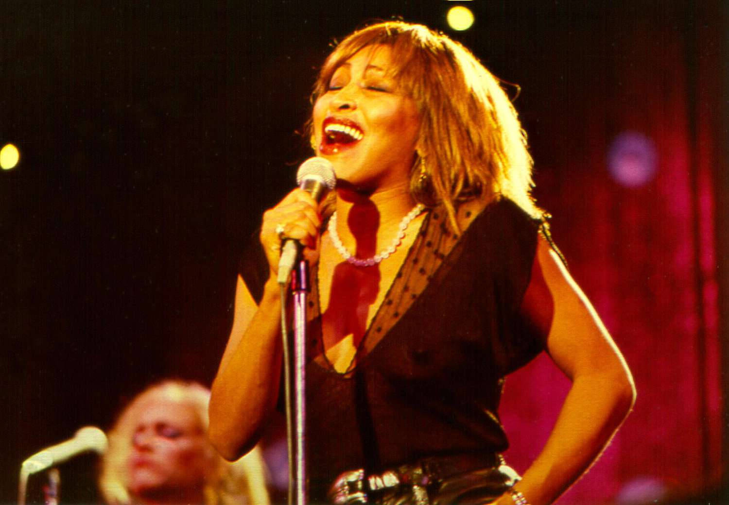 Tina Turner Live Song Performance Background