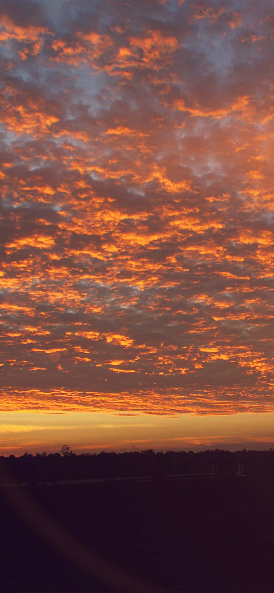 Tiny Orange Sunset Clouds Background