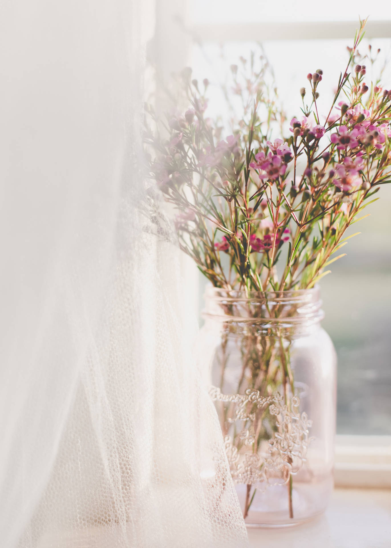 Tiny Pink Flowers In Simple Flower Vase