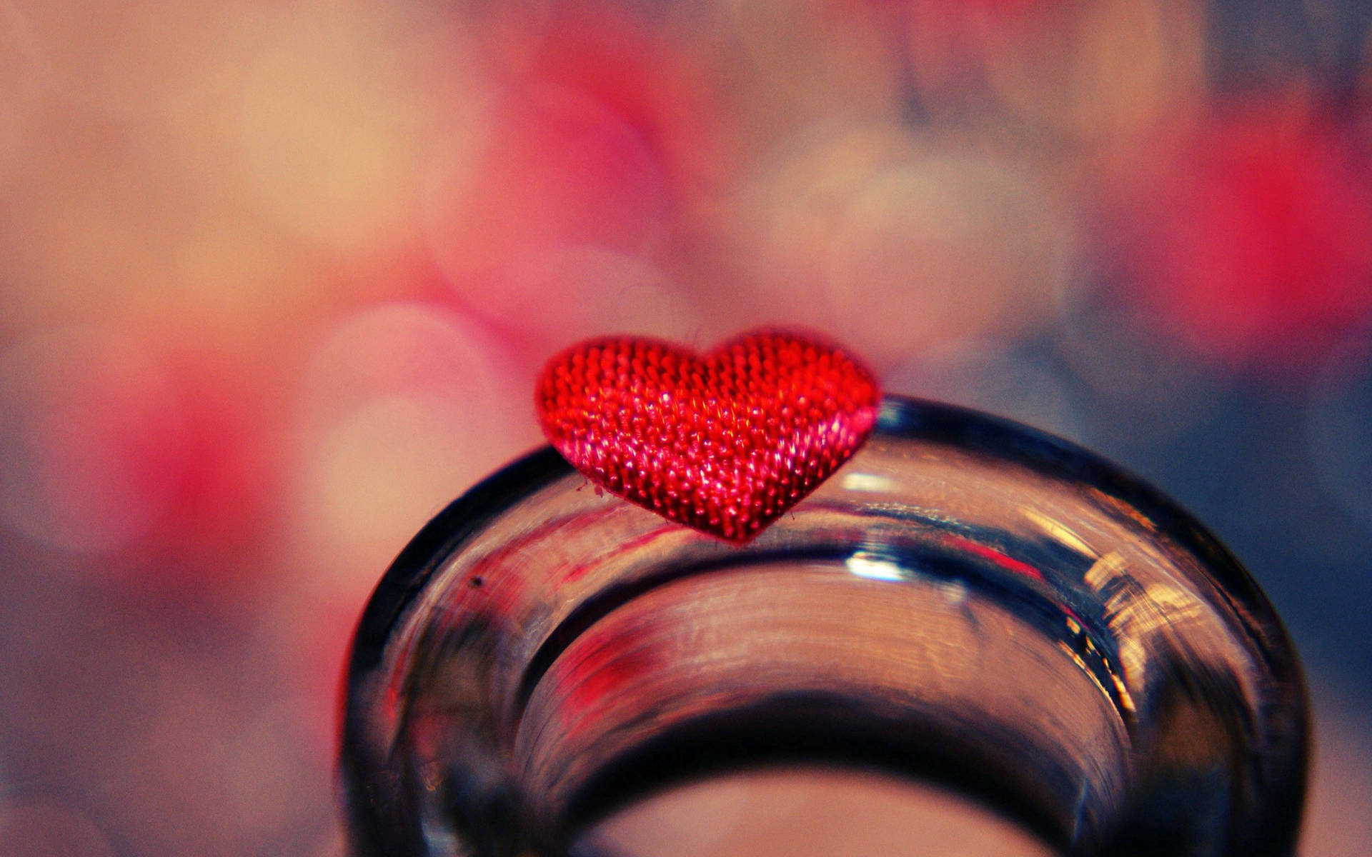 Tiny Red Heart On Bottle Background
