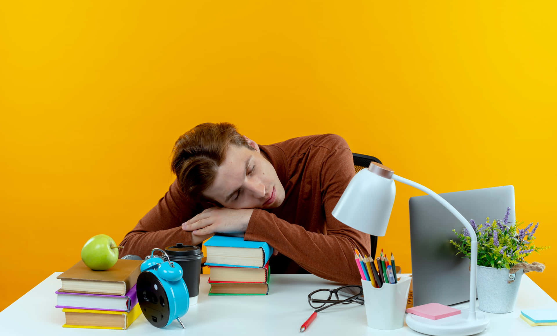 Tired Student Asleepat Desk.jpg Background