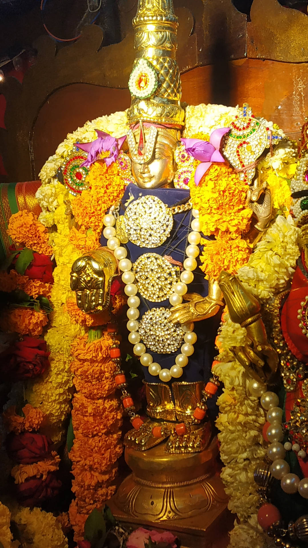 Tirupati Balaji Deity Statue Pearls Background
