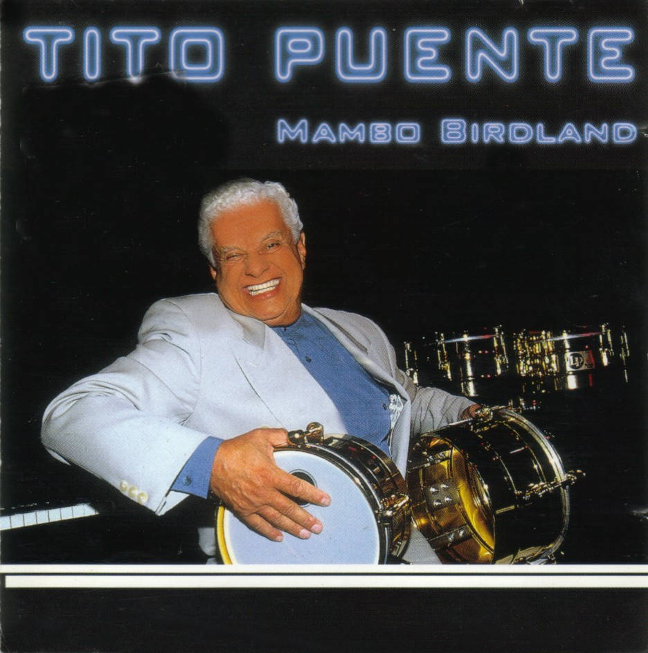 Tito Puente Gritting Teeth Smile Background