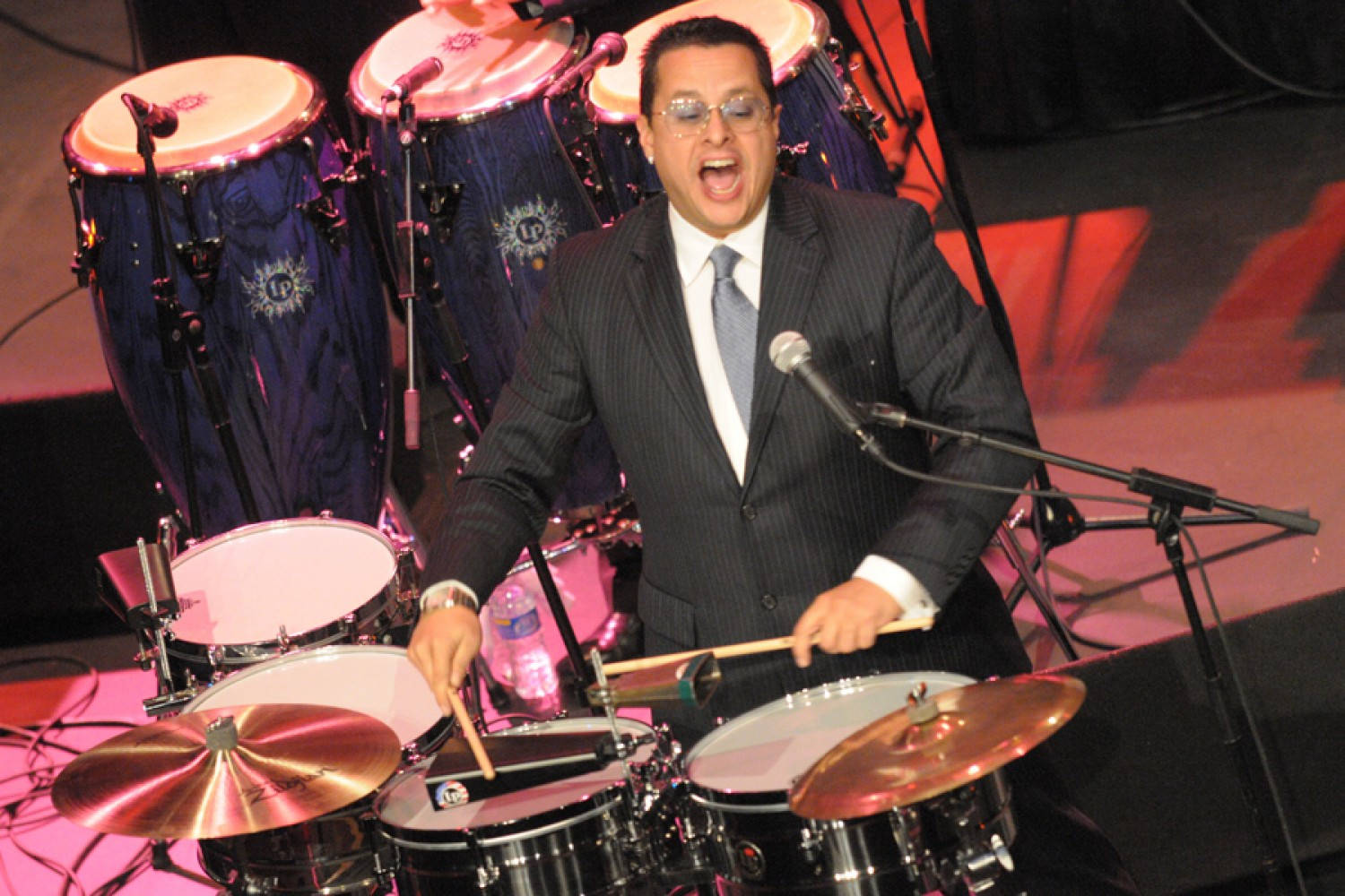 Tito Puente Singing And Drumming Background