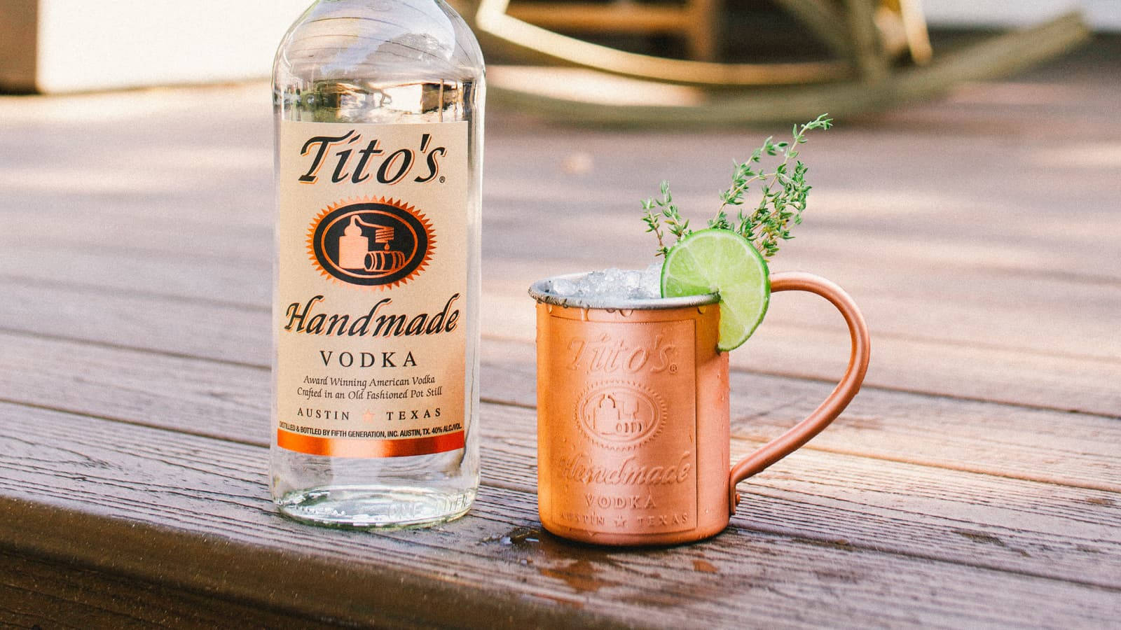 Titos Vodka Served In Copper Cup Background